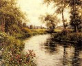 Fleurs en fleurs par un paysage fluvial Louis Aston Knight